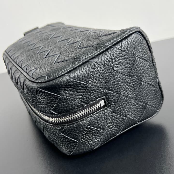 Bottega Veneta Intrecciato Grained Pouch in Black Woven Leather