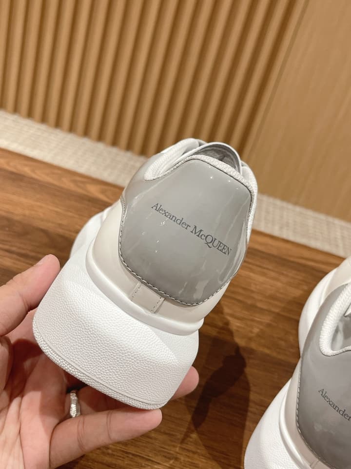 Alexander McQueen Classic Versatile White Sneakers in White With Black Laces & Heel