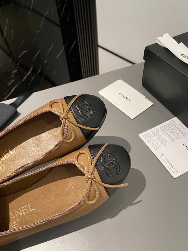 Chanel Classic Ballet Flats in Tan With Black Cap Toe