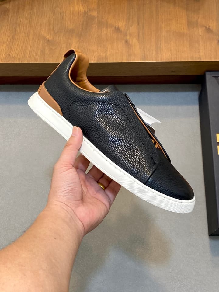 Ermenegildo Zegna Triple Stitch Sneakers in Black Leather With Brown Tag