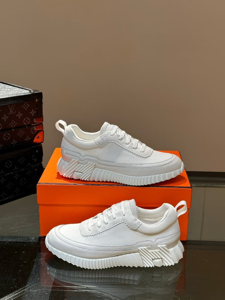 Hermès Bouncing Calfskin Mesh Sneakers in Black With White Stripe