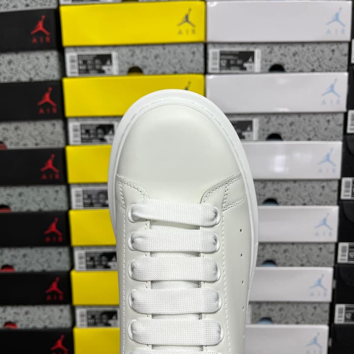 Alexander McQueen Oversized Low-Top Sneakers in All Black With White Sole