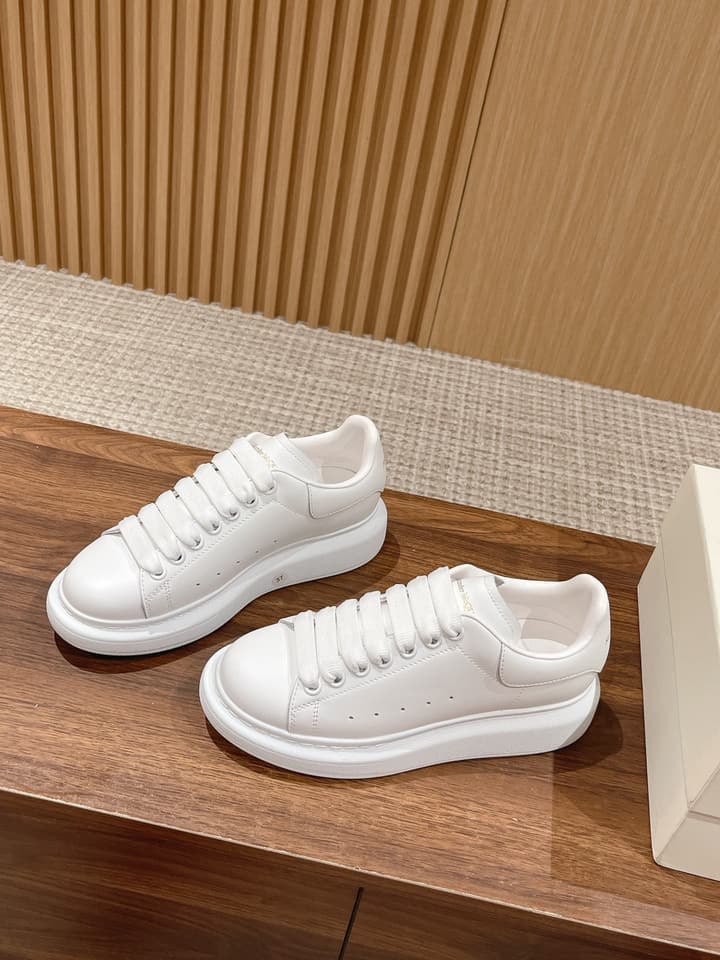 Alexander McQueen Classic Versatile White Sneakers in White With Black Laces & Heel