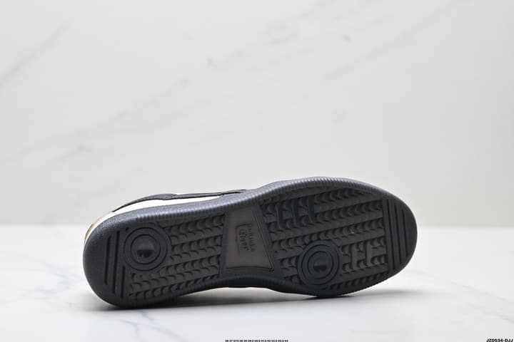 Asics Onitsuka Tiger Tokuten Retro Low-Top Sneakers in Cream Upper With Black Stripes And Black Sole
