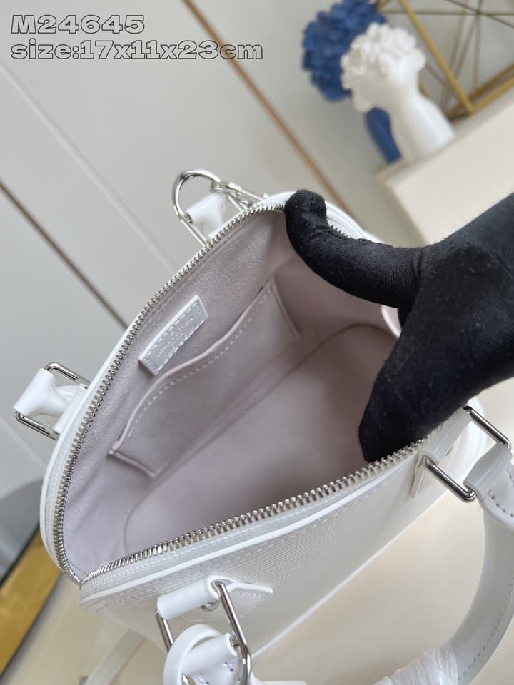 Louis Vuitton Alma BB Handbag in Beige