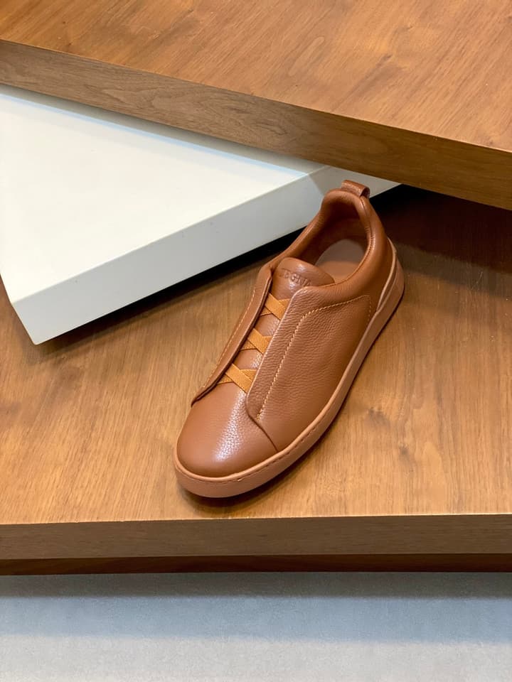 Ermenegildo Zegna Triple Stitch Sneakers in Black Leather With Brown Tag