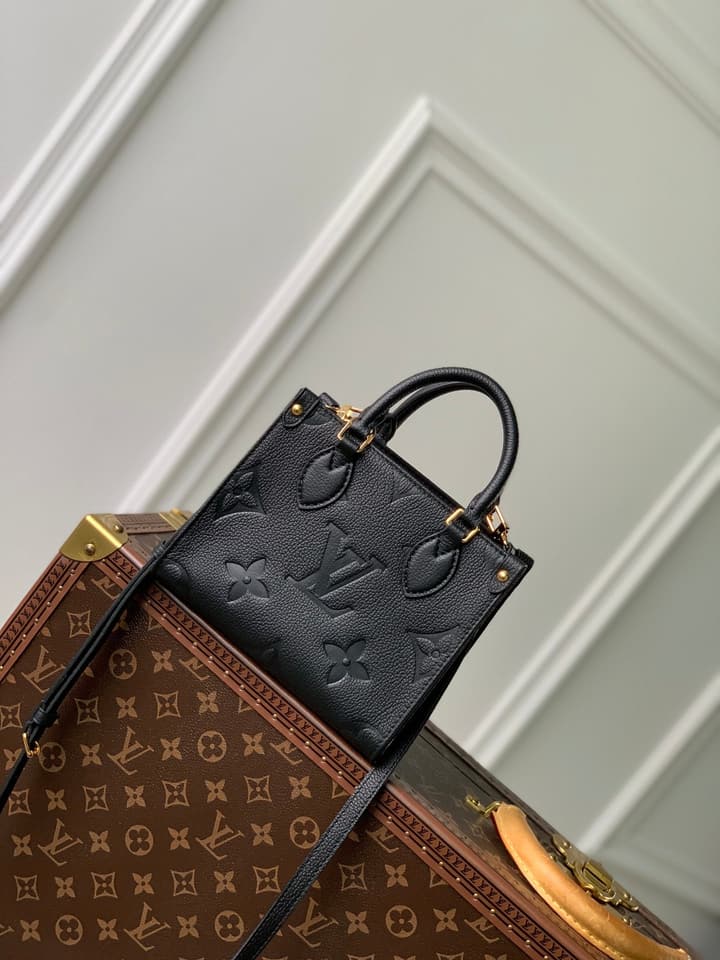 Louis Vuitton OnTheGo BB Monogram Empreinte Handbag in Beige And Cream Monogram