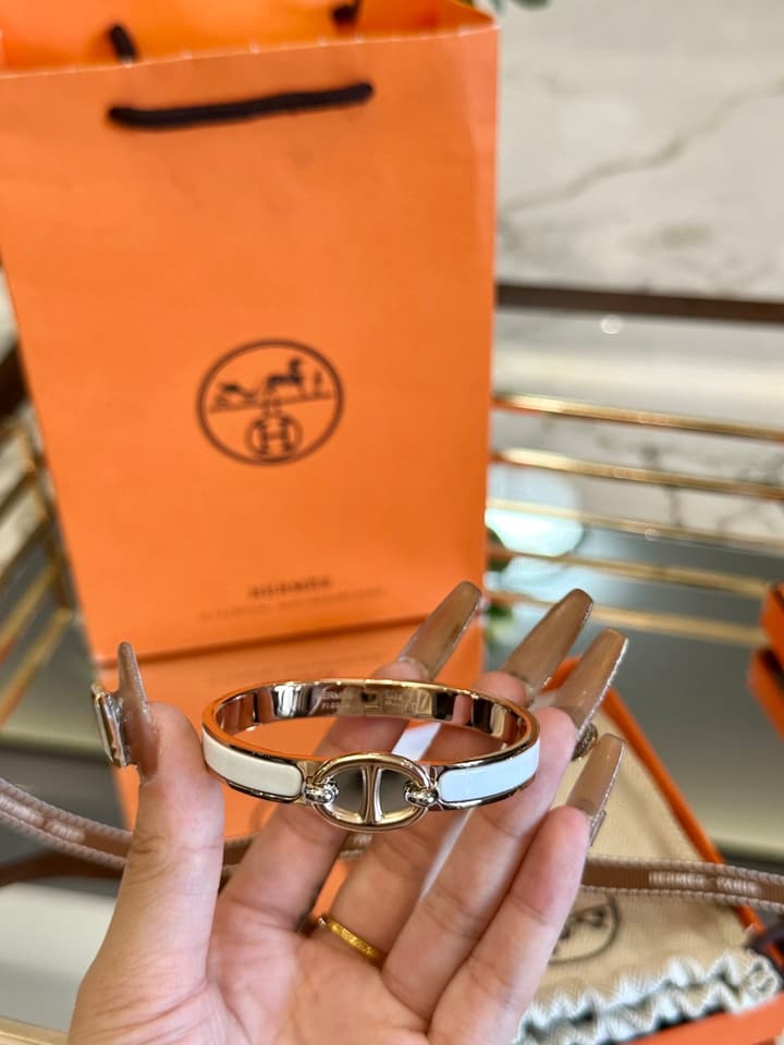 Hermès Pig Nose Enamel Bracelet in Gold