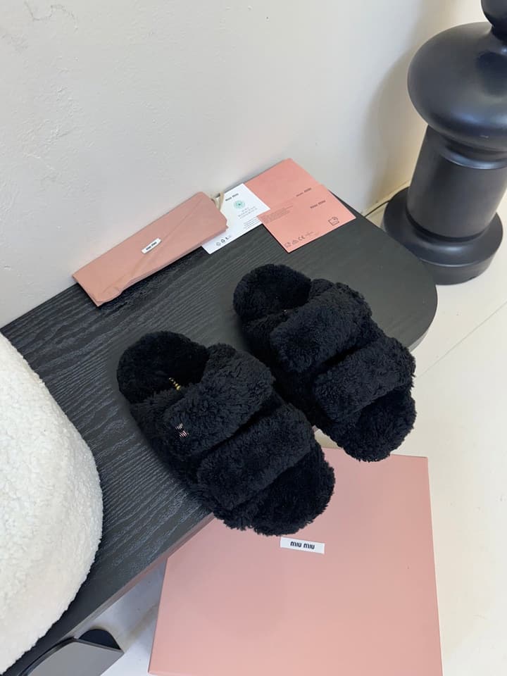 Miu Miu Sheepskin Mules in Black