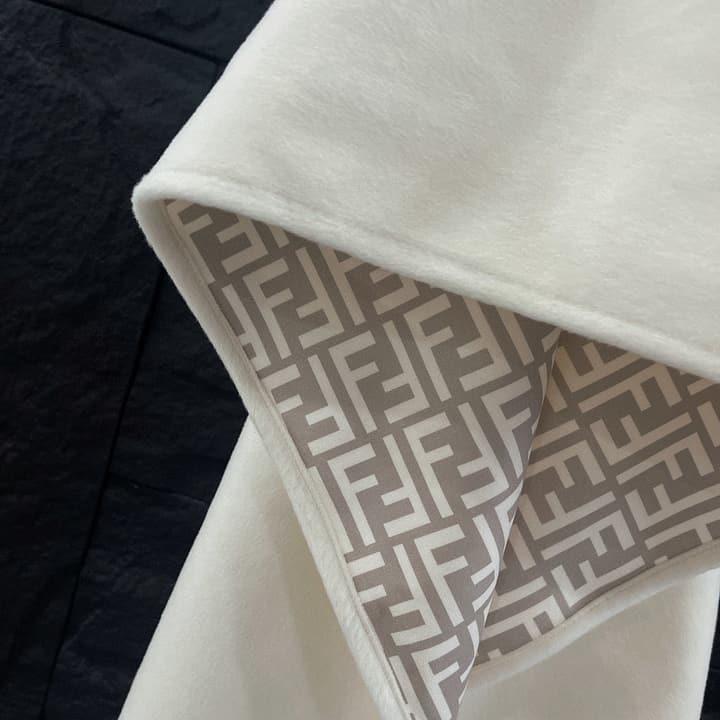 Fendi FF Logo Reversible Wool Cape in Ff Logo Patterned Reverse