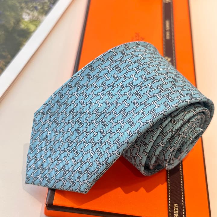 Hermès Men's Printed Silk Tie Series in Light Aqua Patterned