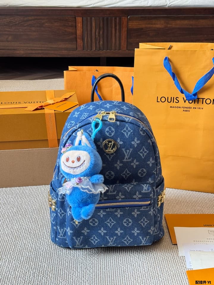 Louis Vuitton Monogram Mini Backpack in Monogram With Light Blue Charm