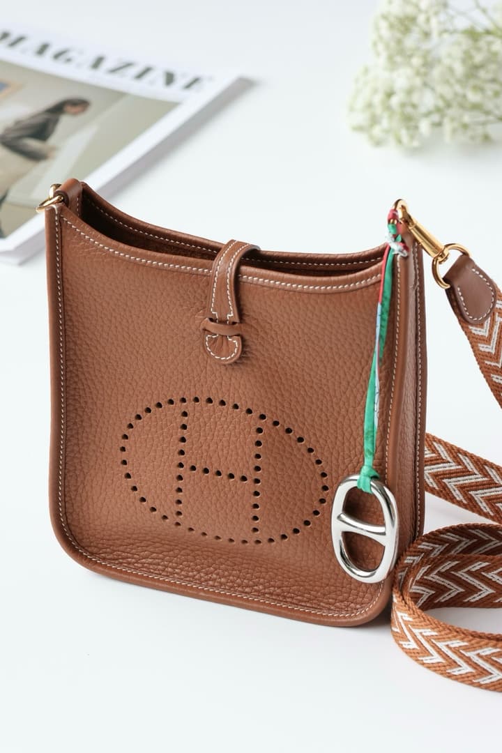 Hermès Mini Evelyne TPM – Gold Brown in Gold Brown With Patterned Strap