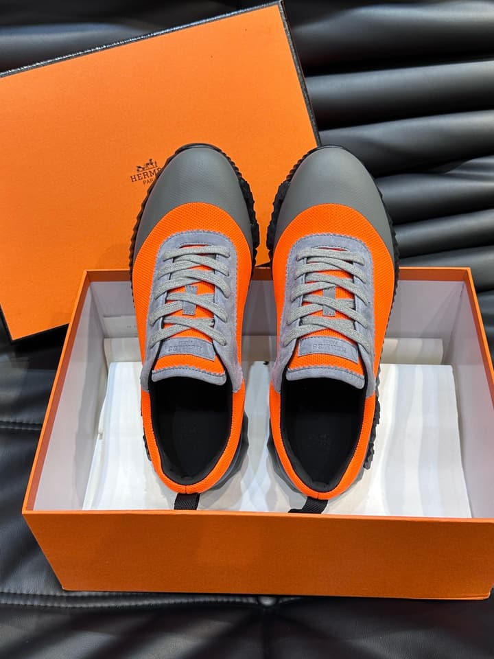 Hermès Bouncing Calfskin Mesh Sneakers in Black With White Stripe