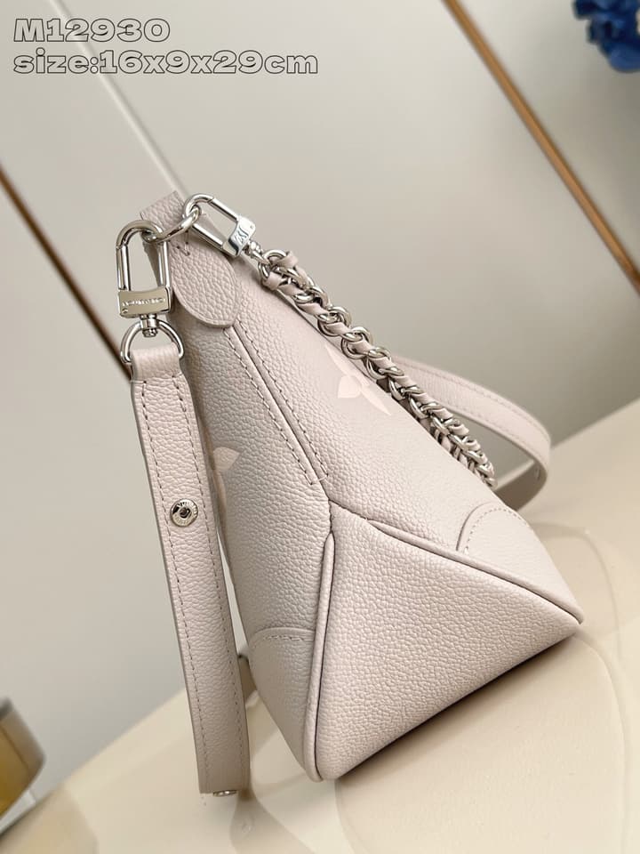 Louis Vuitton Boulogne Monogram Embossed Bag in Beige