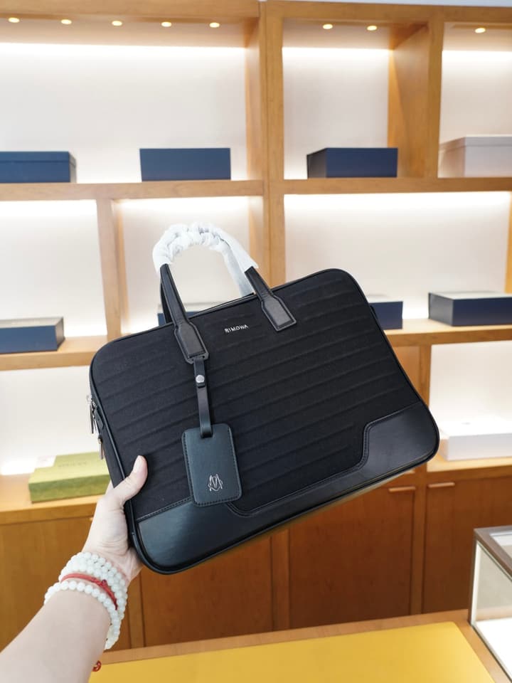 RIMOWA High-Version Crossbody Backpack in Matte Black Briefcase