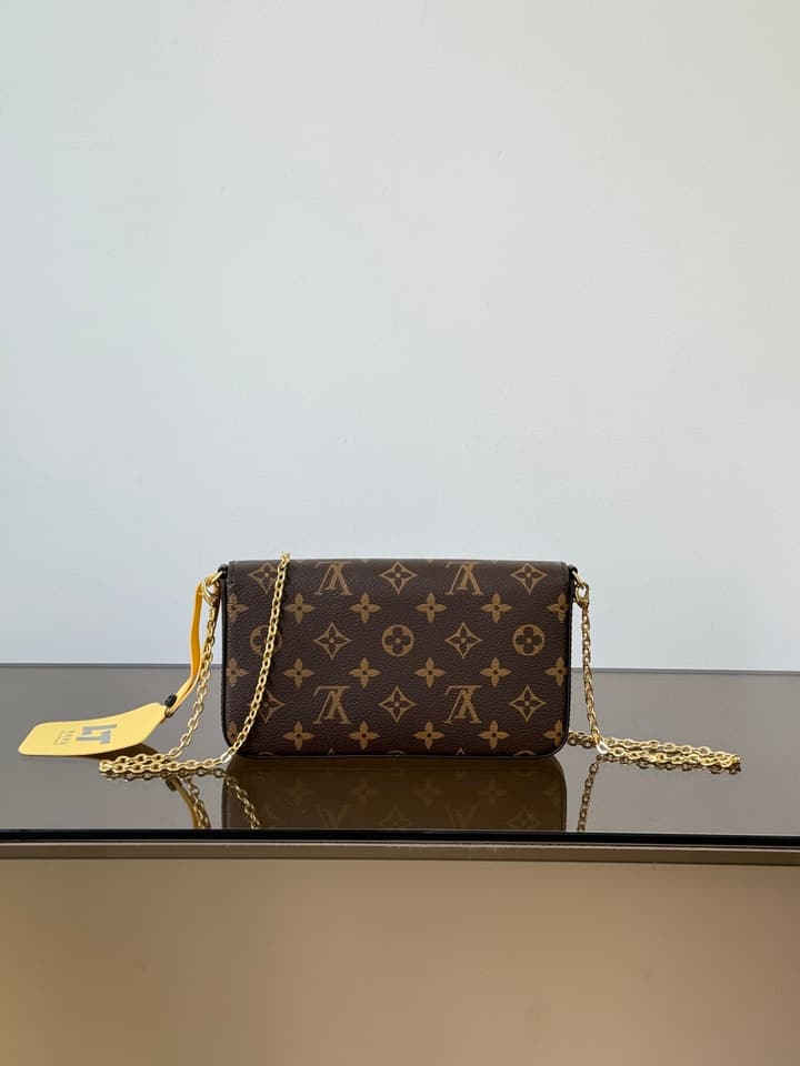 Louis Vuitton Pochette Felicie Monogram Chain Bag in Monogram Canvas With Pink Interior