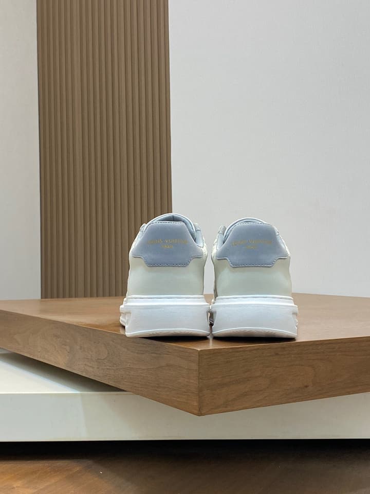 Louis Vuitton Embossed Calfskin Sneakers in Black