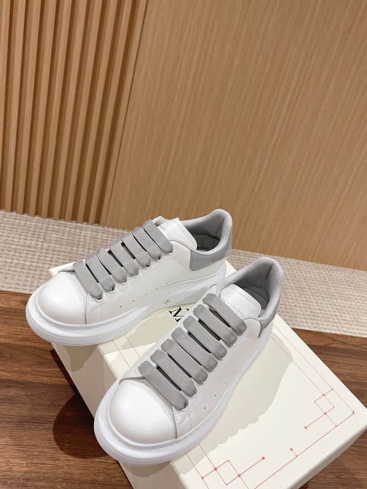 Alexander McQueen Classic Versatile White Sneakers in White With Black Laces & Heel