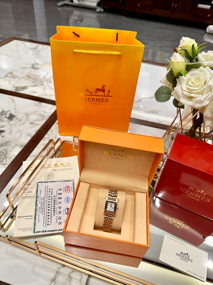 Hermès Small Square Luxury Watch in Dark Dial Patterned Gold Bracelet