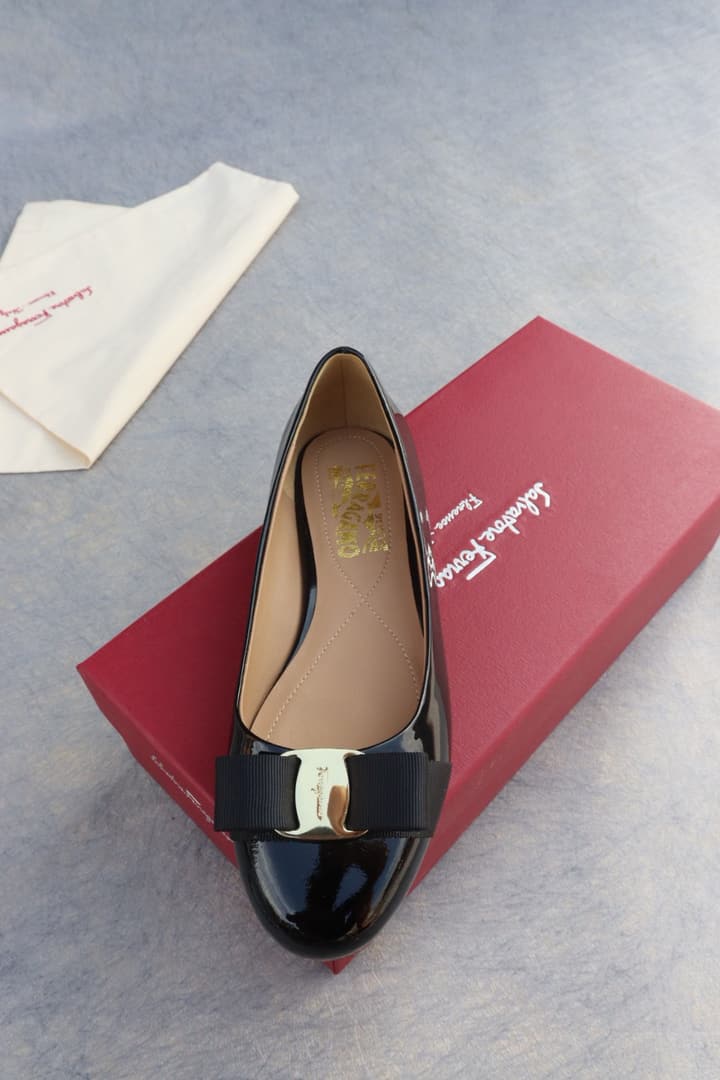 Ferragamo Classic Patent Leather Flats in Black Patent Vara Flats