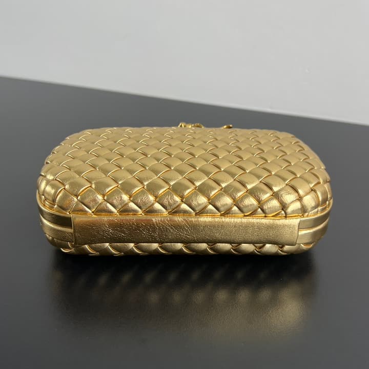 Bottega Veneta Woven Leather Floral Knot Clutch Bag in Gold Woven Leather With Floral Clasp
