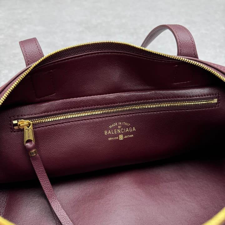 Balenciaga Carrie Leather Bowling Bag – Small in Burgundy