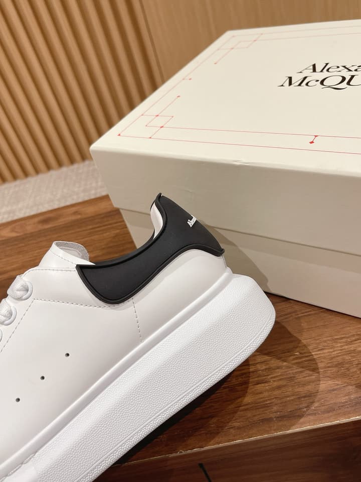 Alexander McQueen Classic Versatile White Sneakers in White With Black Laces & Heel
