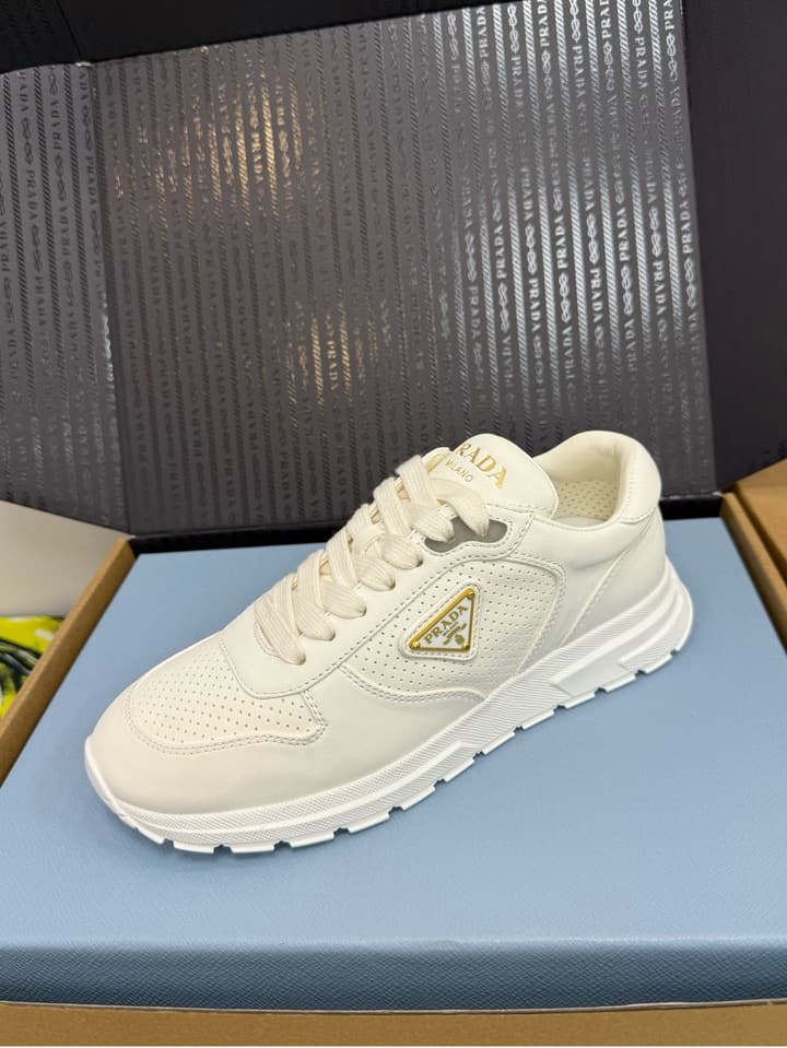 Prada Triangle Logo Sporty Sneakers – 2025 Early Autumn Collection in Black