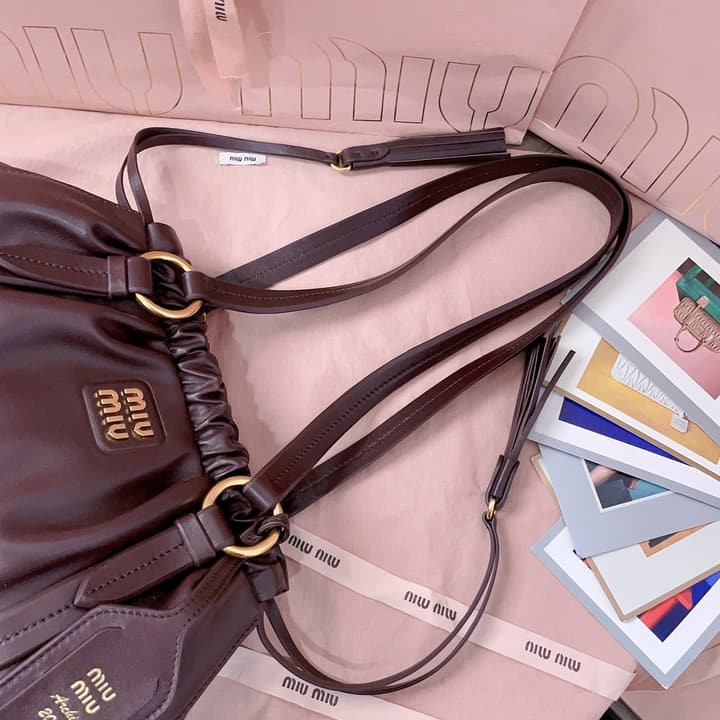 Miu Miu Tassel Drawstring Bucket Bag – New Collection in Black