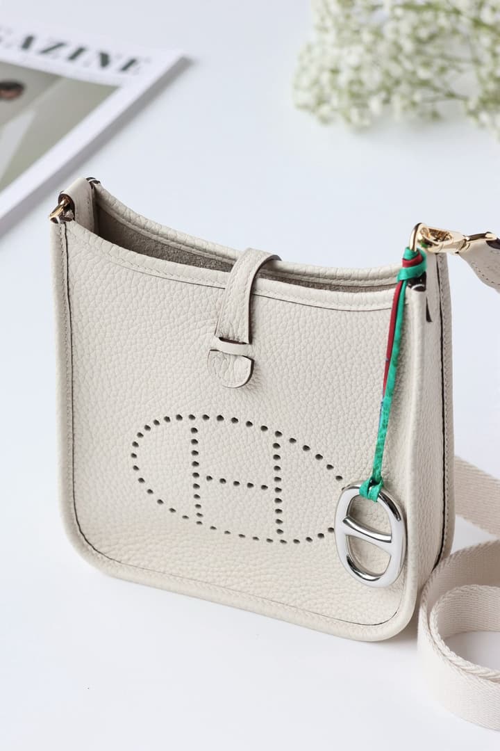 Hermès Mini Evelyne Nata – TC Leather in Nata With Gold Hardware