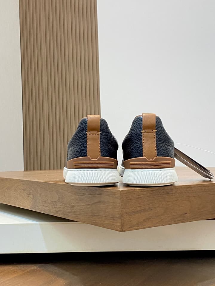 Ermenegildo Zegna Triple Stitch Sneakers in Black Leather With Brown Tag