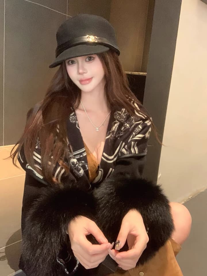 Hermès Old Money Detachable Faux Fur Sleeve Coat in Black With Patterned Reversible Side