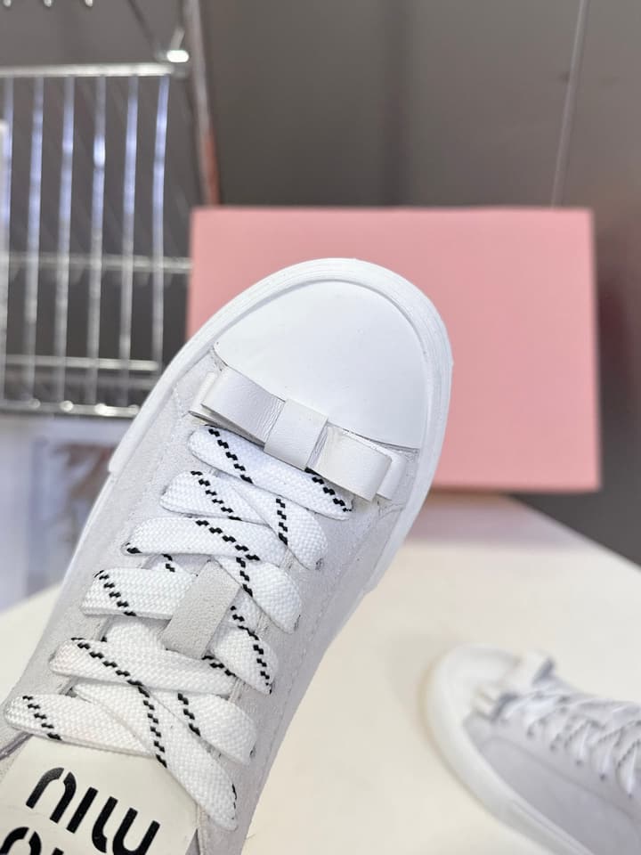 Miu Miu Distressed Retro Double Lace Sneakers in Red
