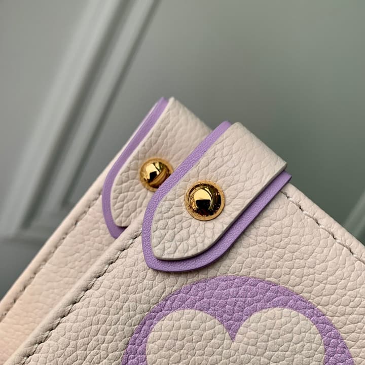 Louis Vuitton ONTHEGO Medium Tote Bag in Cream/white Monogram With Lilac Print