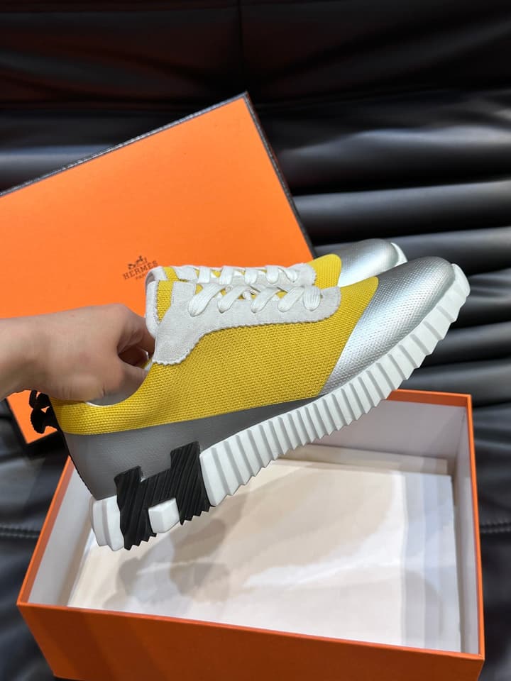 Hermès Bouncing Calfskin Mesh Sneakers in Black With White Stripe