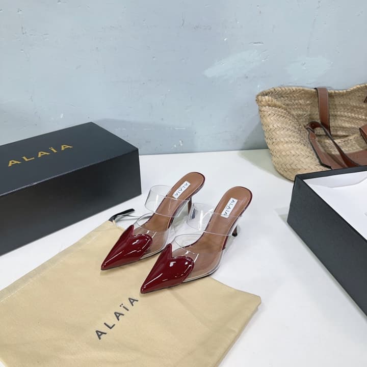 Alaïa Heart PVC Pointed Toe Slingback Mules – Spring/Summer 2025 in Red Patent Toe / Clear Pvc