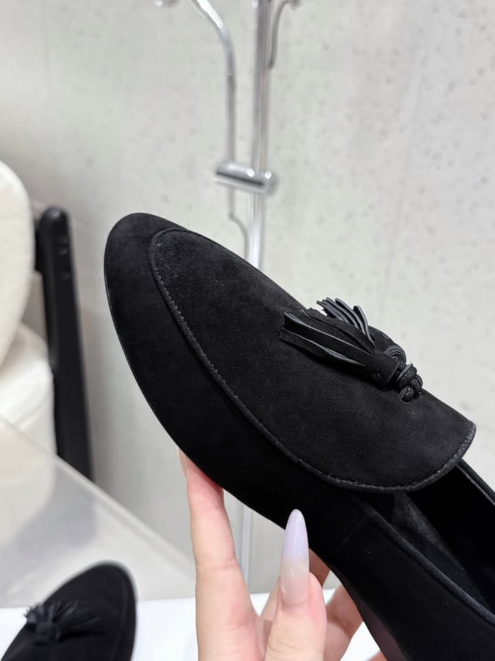 The Row Tassel Loafers in Black Suede