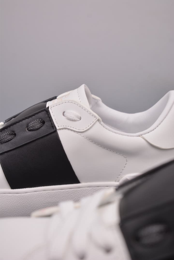Valentino Rockstud Untitled Rivet Sneakers – 2025 Collection in White With Black Band