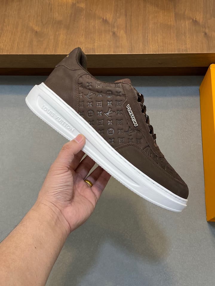 Louis Vuitton Embossed Calfskin Sneakers in Black