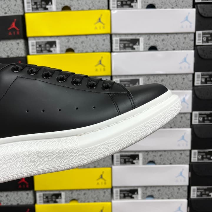 Alexander McQueen Oversized Low-Top Sneakers in All Black With White Sole