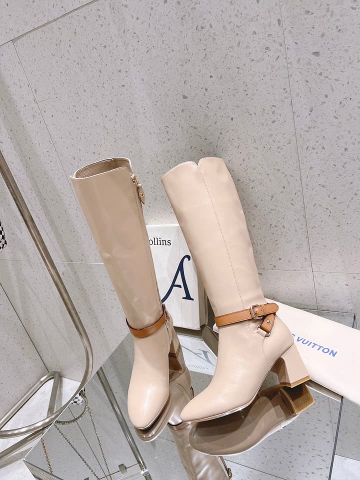 Louis Vuitton Parisienne Leather Knee-High Boots in Black Leather