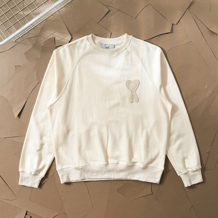 AMI Paris Ami de Coeur Raglan Crewneck Sweatshirt – 25FW in Apricot With Clear Heart