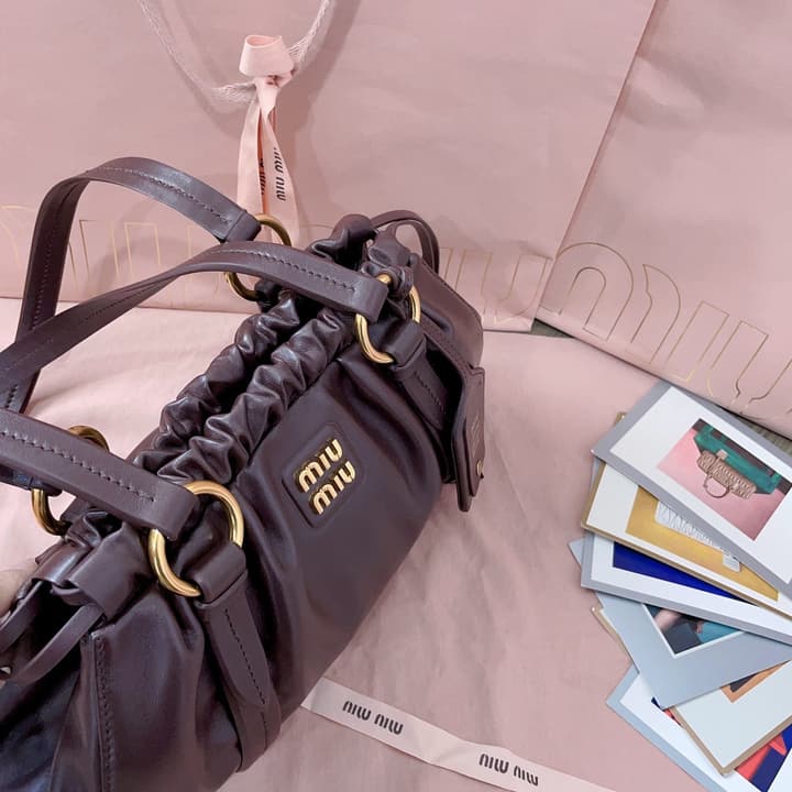 Miu Miu Tassel Drawstring Bucket Bag – New Collection in Black