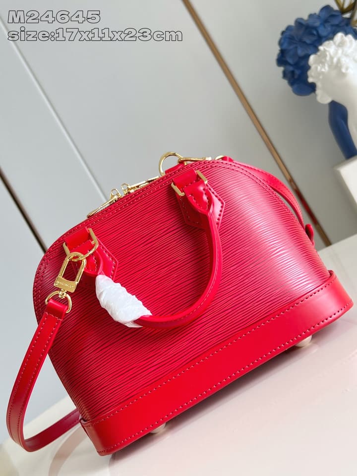 Louis Vuitton Alma BB Handbag in Beige