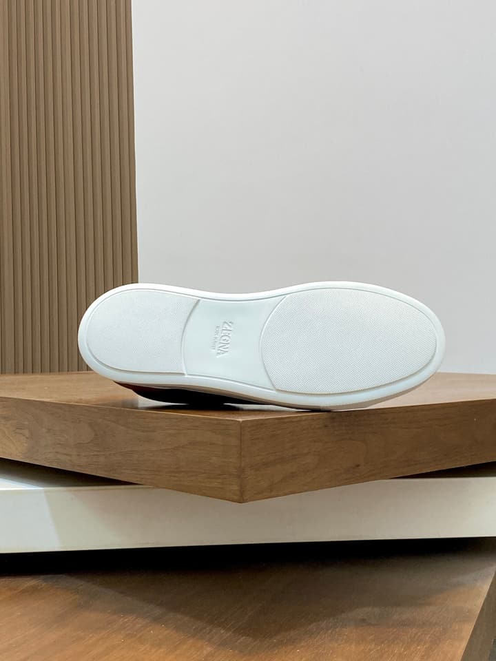 Ermenegildo Zegna Triple Stitch Sneakers in Black Leather With Brown Tag