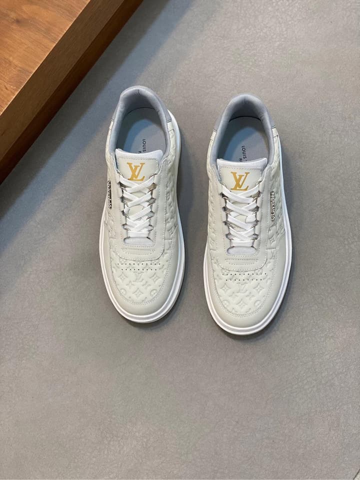 Louis Vuitton Embossed Calfskin Sneakers in Black