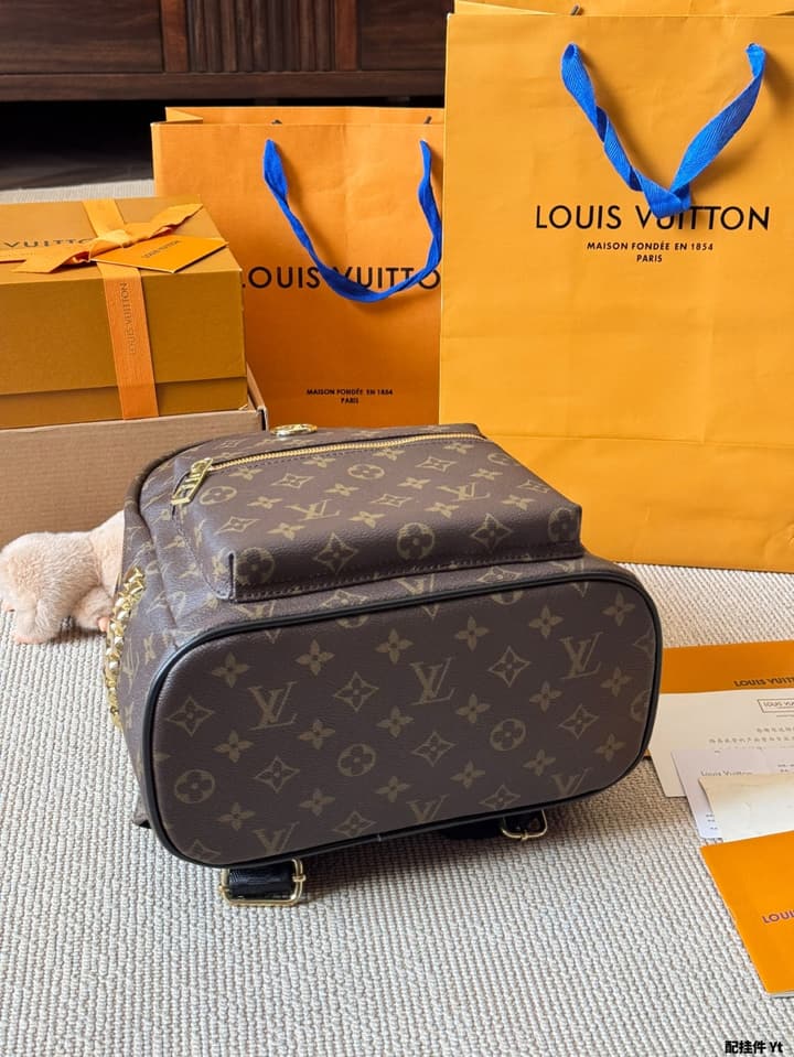 Louis Vuitton Monogram Mini Backpack in Monogram With Light Blue Charm