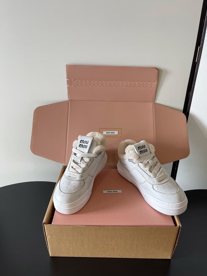 Miu Miu Distressed Retro German Training Sneakers in Distressed Off-white