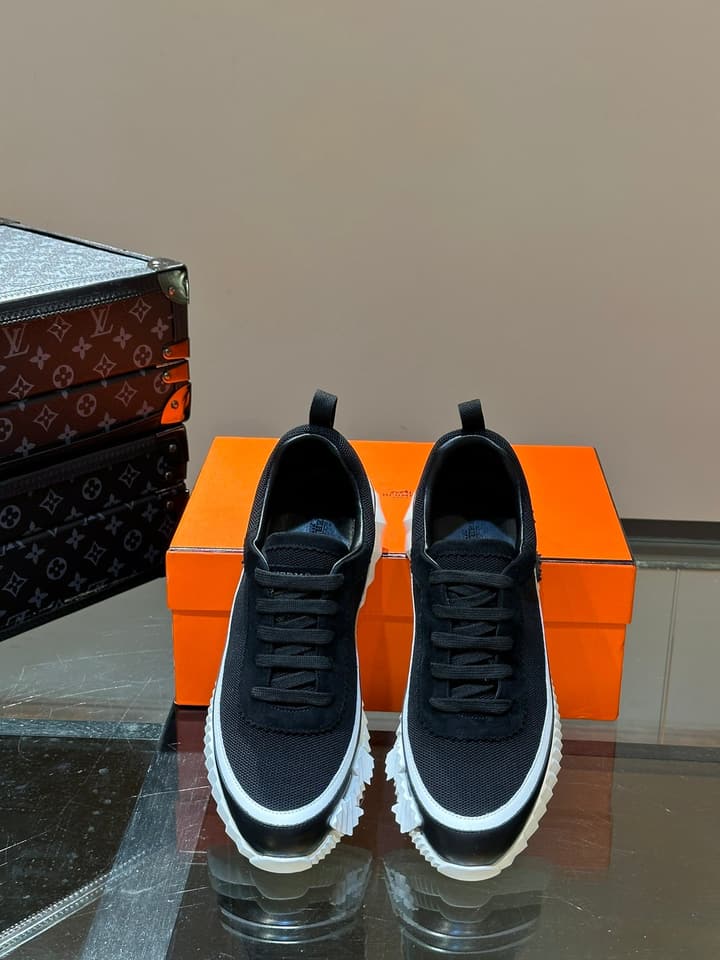 Hermès Bouncing Calfskin Mesh Sneakers in Black With White Stripe